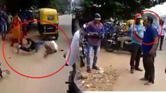 మద్యం మత్తులో ట్రాఫిక్ పోలీసుల పై వీరంగం...వైరల్ అయిన వీడియో