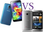 Samsung Galaxy S5 Vs HTC One (M8): And the First Cake of the Year Goes To..