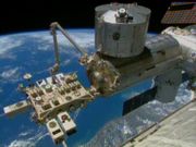 Robotic arms install remote-sensing instrument on ISS