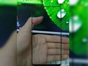 Leaked Xiaomi Mi Mix 2 front panel shows selfie camera at the bottom