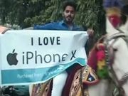 A man rode on a horse like a boss to purchase his Apple iPhone X in India