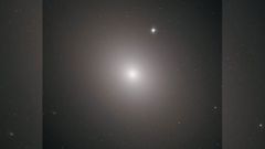 NASA's Hubble telescope snaps massive elliptical galaxy with 200 billion stars