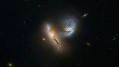NASA Hubble Snaps Galaxy Collision In Spectacular Detail