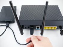 How to create a remotely accessible networked storage using your Wi-Fi router and a hard drive
