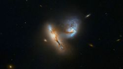 NASA Hubble Snaps Galaxy Collision In Spectacular Detail