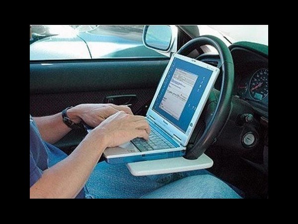 Laptop steering wheel desk
