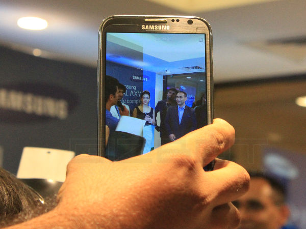 Samsung Galaxy S4 Camera Shoots Genelia D'Souza and Manu Sharma, Director, Samsung Mobile at the Samsung Galaxy S4 launch in Bangalore