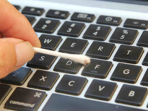 Cotton Swab Around Keys