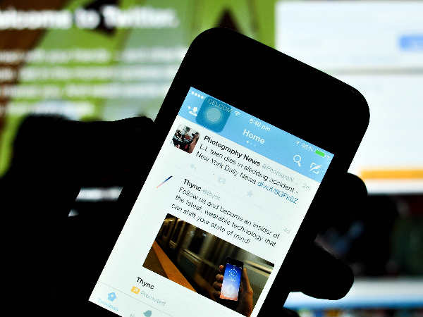 Twitter to free room for links and photos: report