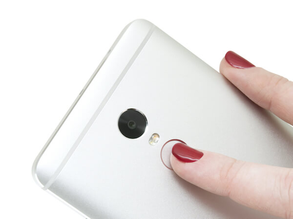  At the back, below the camera module