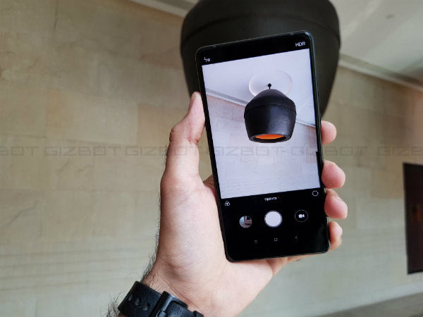 Camera: 12MP rear camera with OIS and 4K video recording support