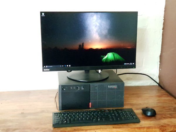 Compact design that easily fits under a table or can be placed horizontally/vertically on a PC table