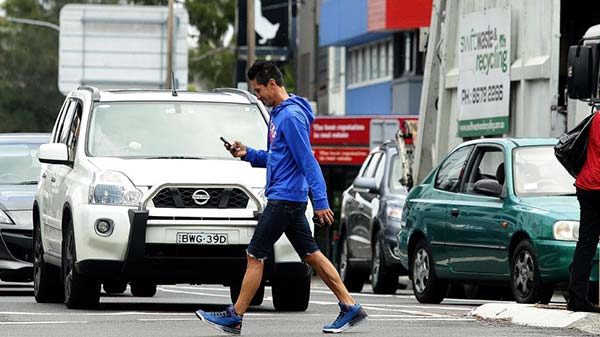 While crossing the road