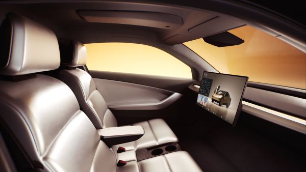 Tesla’s New Car Has No Steering Wheel or Pedals, and It Drives Itself