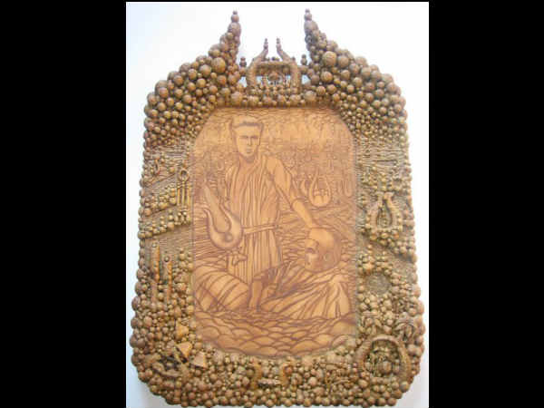 Carving of James Dean and Elvis Presley
