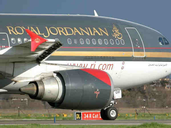 అమెరికా వెళ్లే ప్ర‌యాణికులు