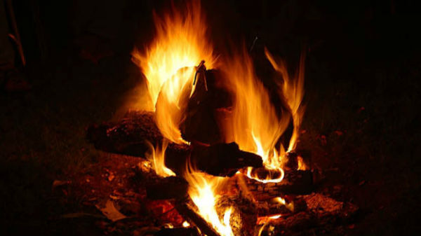 కర్రతో బాది శవానికి  పెట్రోల్‌ పోసి నిప్పటించాడు..... 